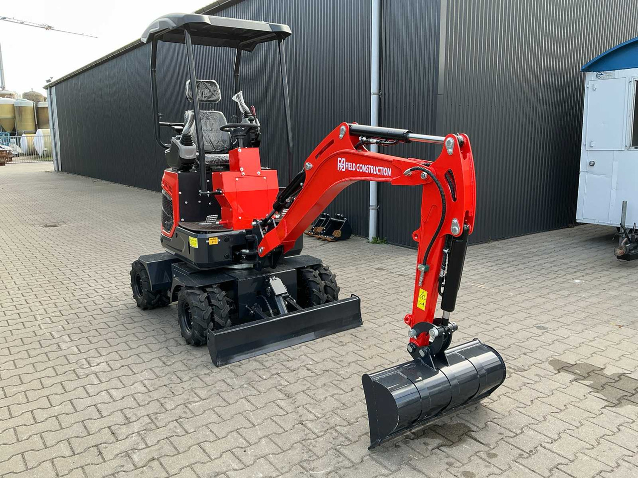 Field Construction HFT-15 - Ratastel ekskavaator: pilt 3 Field Construction HFT-15 - Ratastel ekskavaator: pilt 3