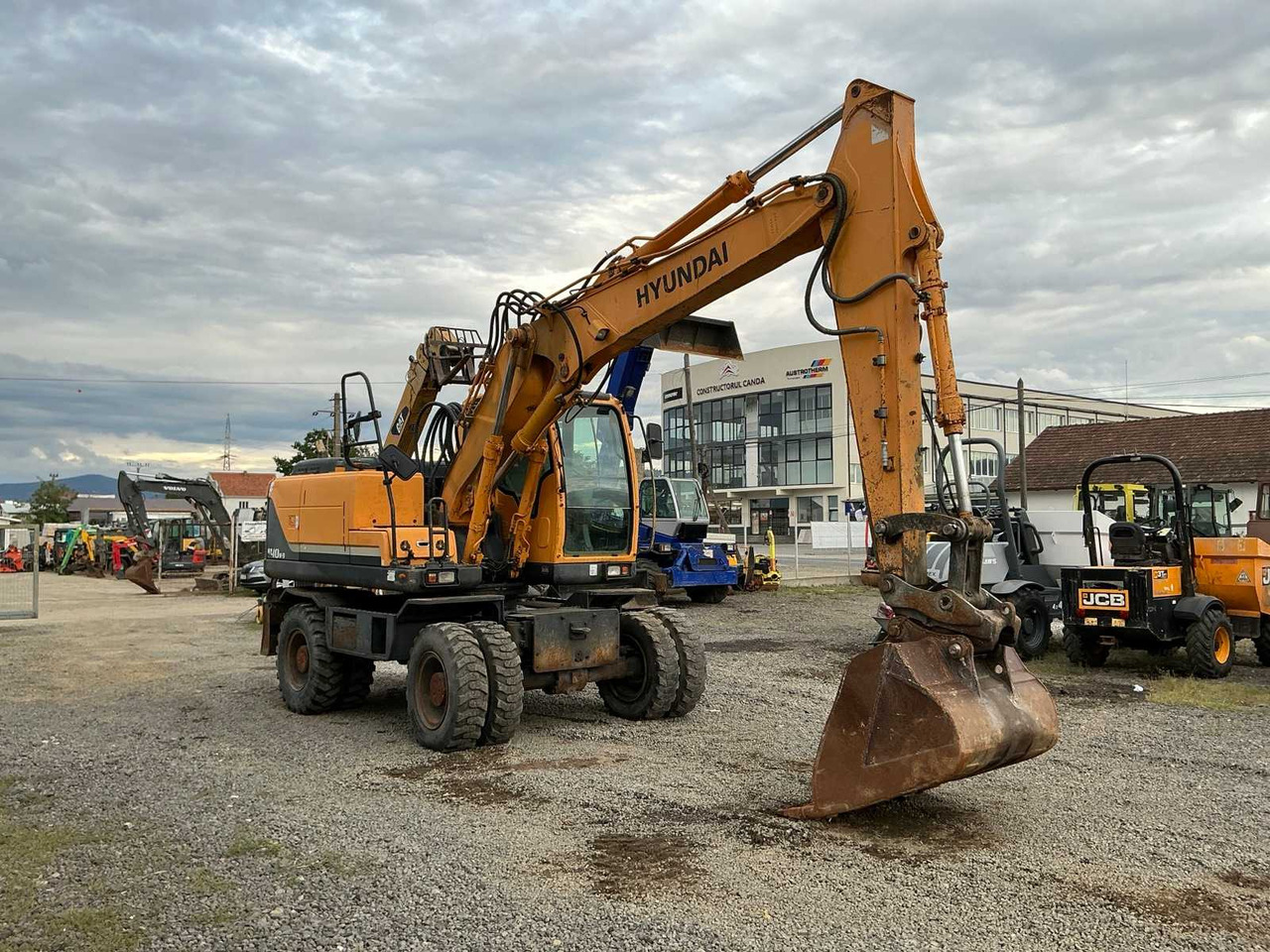 HYUNDAI ROBEX 140W-9 - Ratastel ekskavaator: pilt 4 HYUNDAI ROBEX 140W-9 - Ratastel ekskavaator: pilt 4
