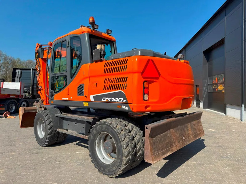 Doosan DX140-3 6000 uur ! NL Machine - Ratastel ekskavaator: pilt 2 Doosan DX140-3 6000 uur ! NL Machine - Ratastel ekskavaator: pilt 2