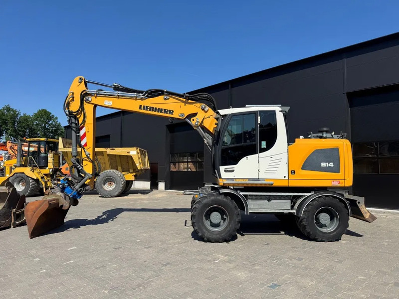 Liebherr A914 2018 8950 uur NL Machine - Ratastel ekskavaator: pilt 1 Liebherr A914 2018 8950 uur NL Machine - Ratastel ekskavaator: pilt 1