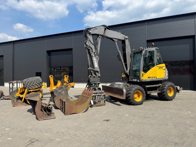 Mecalac 714MW FULL ATTACHMENTS OVERCOMPLEET !!! - Ratastel ekskavaator: pilt 2 Mecalac 714MW FULL ATTACHMENTS OVERCOMPLEET !!! - Ratastel ekskavaator: pilt 2