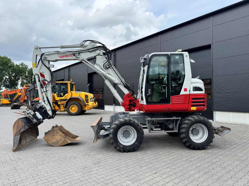 Takeuchi TB295W BJ 2021 3500 uur Compacttilt Draaikantelstuk met Gripper ! - Ratastel ekskavaator: pilt 1 Takeuchi TB295W BJ 2021 3500 uur Compacttilt Draaikantelstuk met Gripper ! - Ratastel ekskavaator: pilt 1