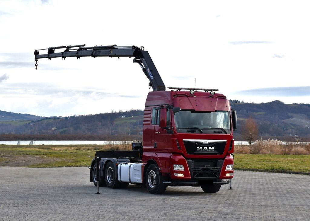 MAN TGX 28.480 Sattelzugmaschine + HMF 2120 K5/FUNK - Kraanaga veoauto: pilt 2 MAN TGX 28.480 Sattelzugmaschine + HMF 2120 K5/FUNK - Kraanaga veoauto: pilt 2