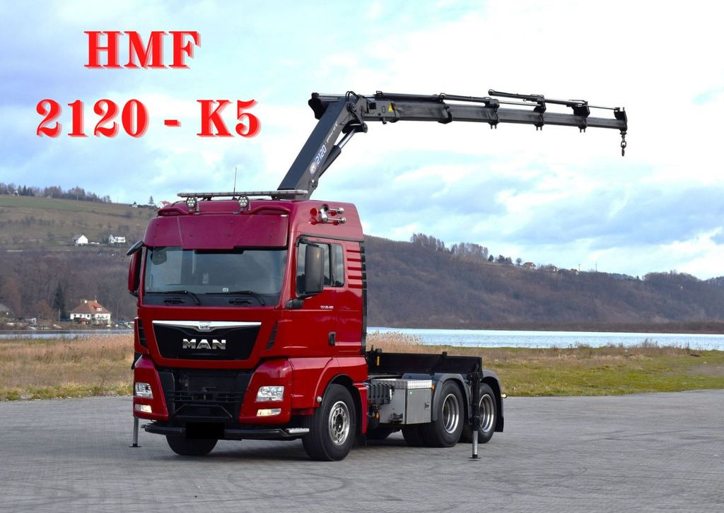 MAN TGX 28.480 Sattelzugmaschine + HMF 2120 K5/FUNK - Kraanaga veoauto: pilt 1 MAN TGX 28.480 Sattelzugmaschine + HMF 2120 K5/FUNK - Kraanaga veoauto: pilt 1