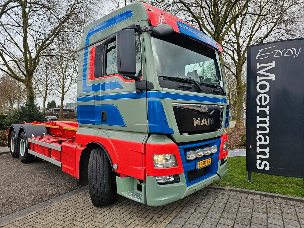 MAN TGX 26.560 XLX 6x4 Abrollkipper - Konkstõstukiga veoauto: pilt 1 MAN TGX 26.560 XLX 6x4 Abrollkipper - Konkstõstukiga veoauto: pilt 1