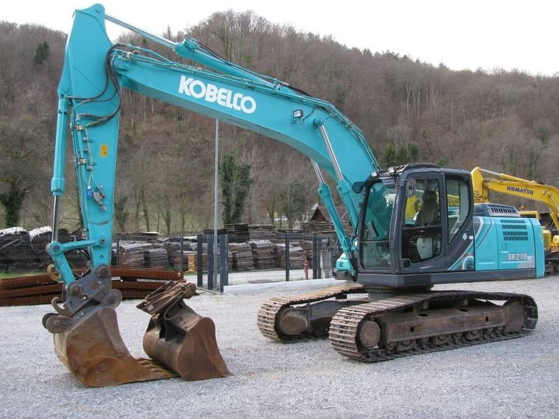 Kobelco SK210NLC-10 Vsa oprema TOP stanje - Lintekskavaator: pilt 1 Kobelco SK210NLC-10 Vsa oprema TOP stanje - Lintekskavaator: pilt 1