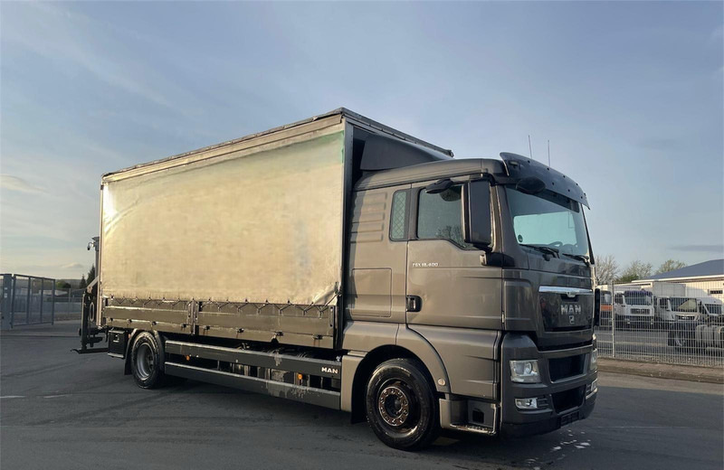 MAN TGX 18.400 Curtain Sider + Crane Palfinger 14002 EH - Kasti veoauto: pilt 1 MAN TGX 18.400 Curtain Sider + Crane Palfinger 14002 EH - Kasti veoauto: pilt 1