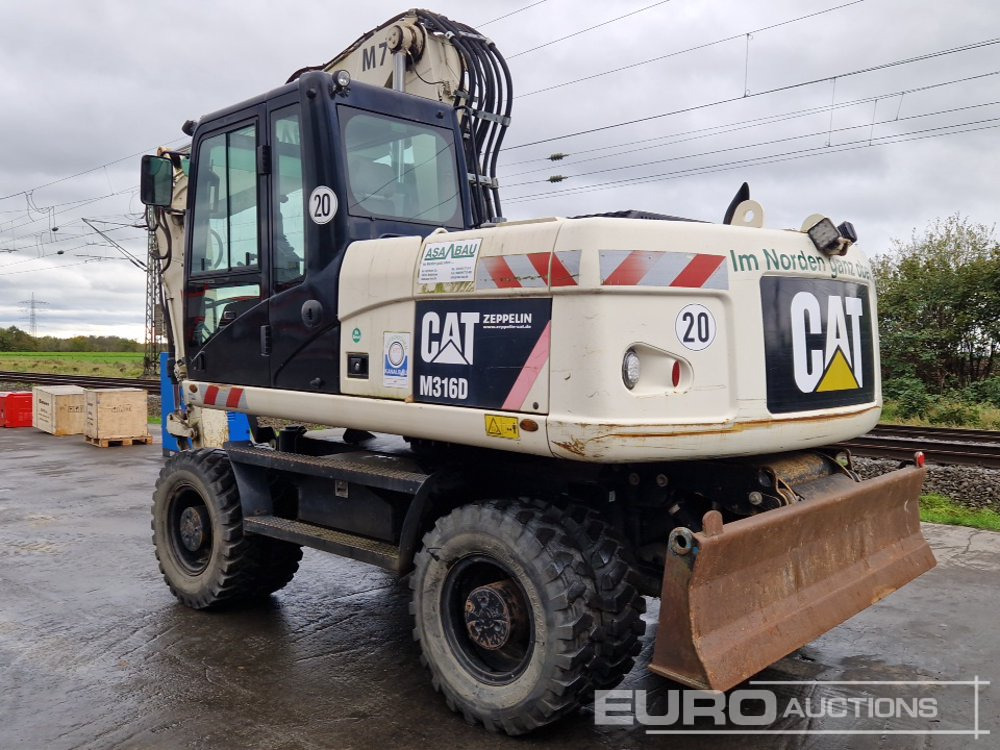 2011 CAT M316D - Ratastel ekskavaator: pilt 3 2011 CAT M316D - Ratastel ekskavaator: pilt 3