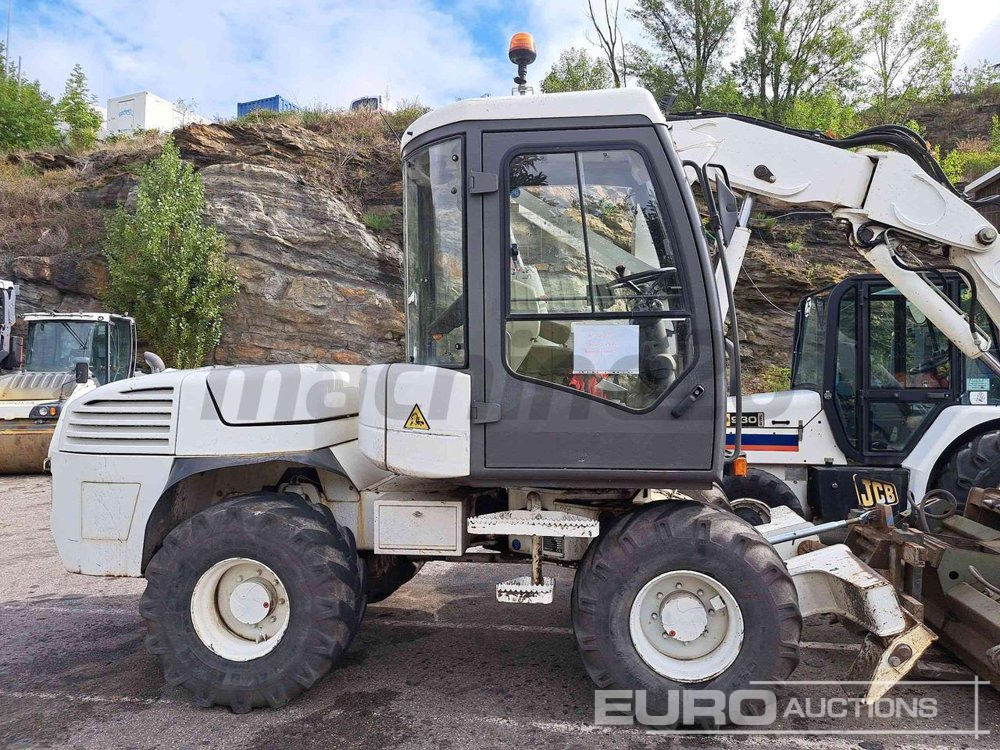 2014 Mecalac 12 MTX - Ratastel ekskavaator: pilt 1 2014 Mecalac 12 MTX - Ratastel ekskavaator: pilt 1
