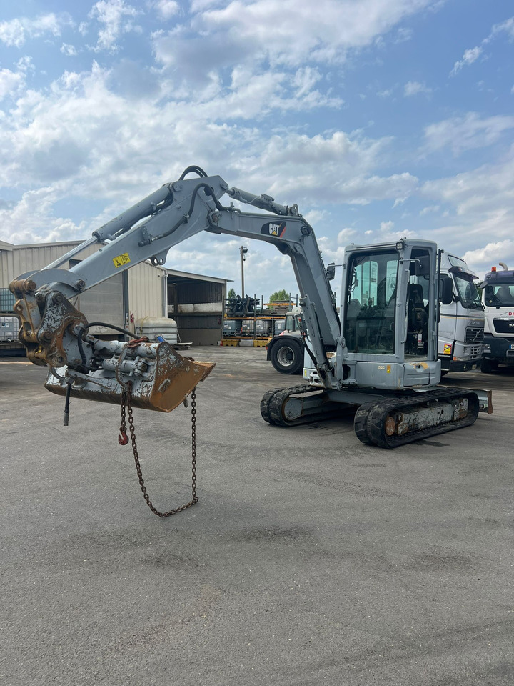Mini-pelle Caterpillar 305E2 - Miniekskavaator: pilt 1 Mini-pelle Caterpillar 305E2 - Miniekskavaator: pilt 1