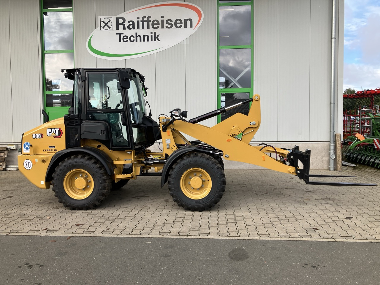 Caterpillar 908 HL - Rataslaadur: pilt 1 Caterpillar 908 HL - Rataslaadur: pilt 1