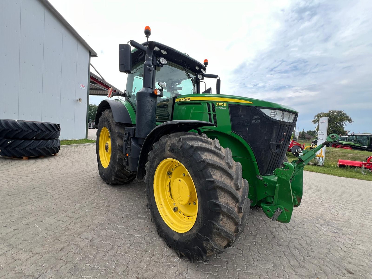 John Deere 7310 R - Traktor: pilt 1 John Deere 7310 R - Traktor: pilt 1