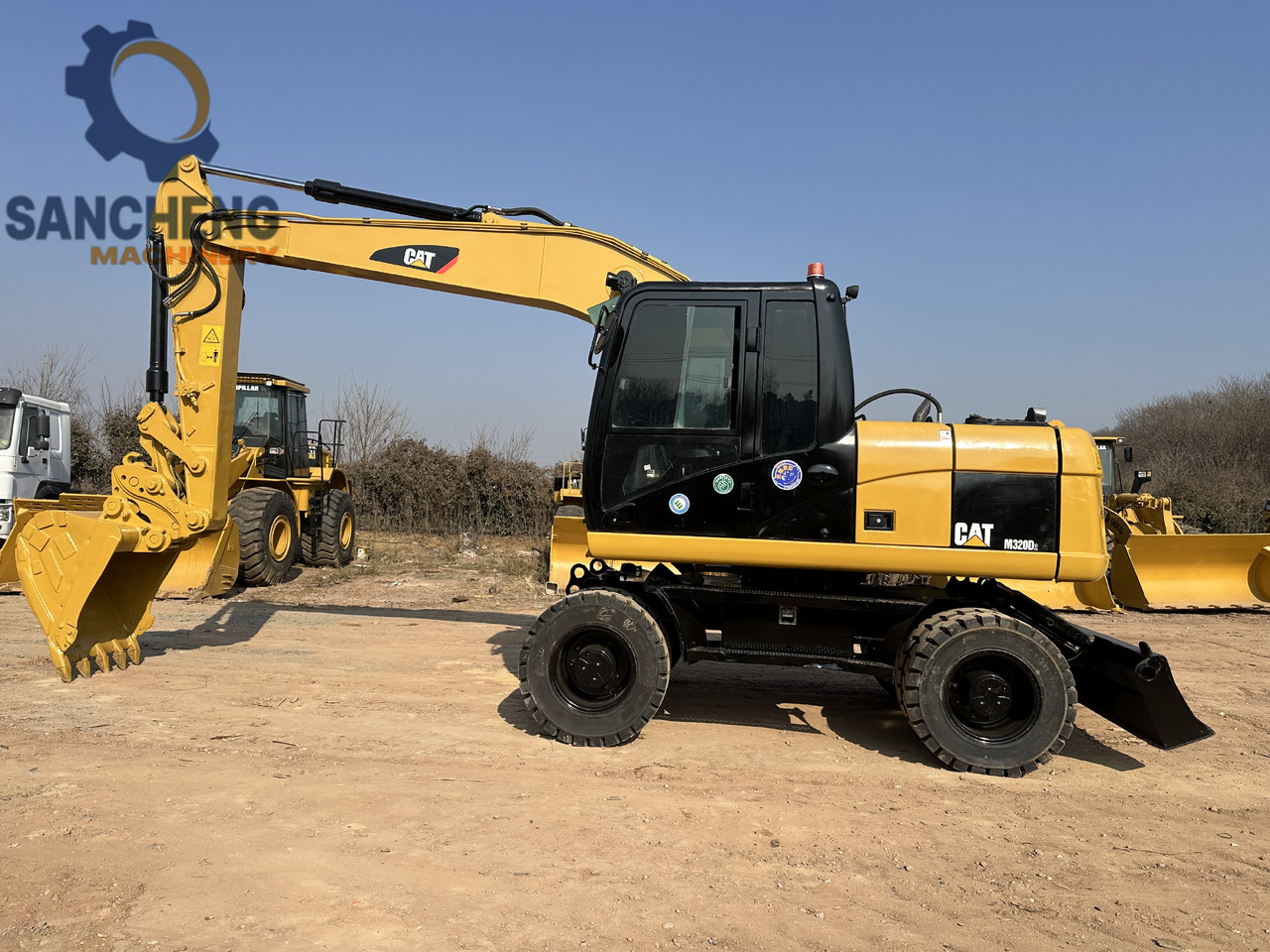 CATERPILLAR M320D2 - Ratastel ekskavaator: pilt 2 CATERPILLAR M320D2 - Ratastel ekskavaator: pilt 2