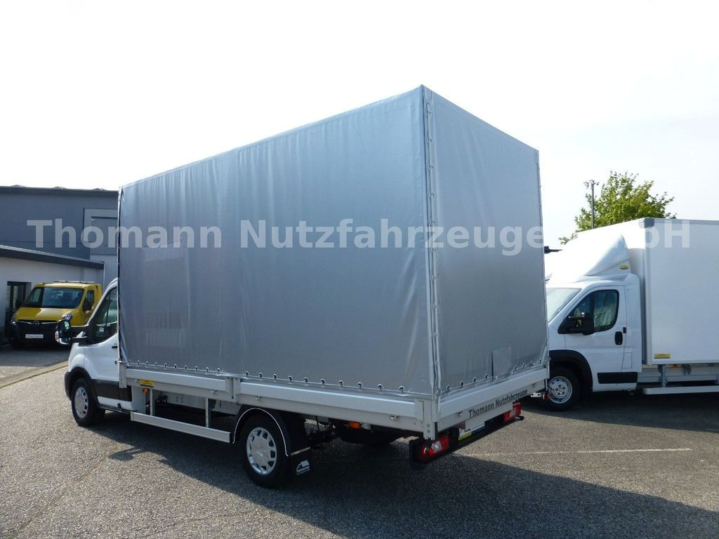 Ford Transit Pritsche Plane 4,25m Klima Temp. DAB Ford Transit Pritsche Plane 4,25m Klima Temp. DAB - Tent tarbesõiduk: pilt 5 Ford Transit Pritsche Plane 4,25m Klima Temp. DAB Ford Transit Pritsche Plane 4,25m Klima Temp. DAB - Tent tarbesõiduk: pilt 5