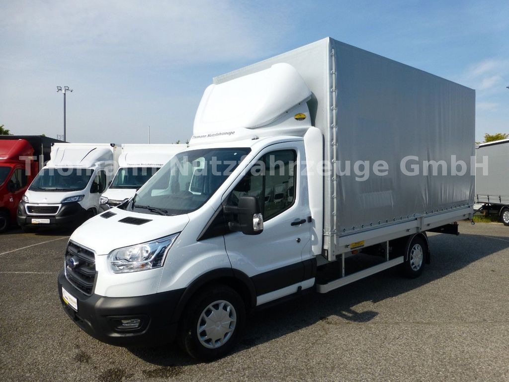 Ford Transit Pritsche Plane 4,25m Klima Temp. DAB Ford Transit Pritsche Plane 4,25m Klima Temp. DAB - Tent tarbesõiduk: pilt 2 Ford Transit Pritsche Plane 4,25m Klima Temp. DAB Ford Transit Pritsche Plane 4,25m Klima Temp. DAB - Tent tarbesõiduk: pilt 2