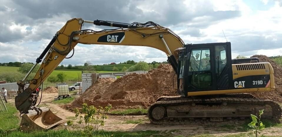 Lintekskavaator Caterpillar 319 D: pilt 1