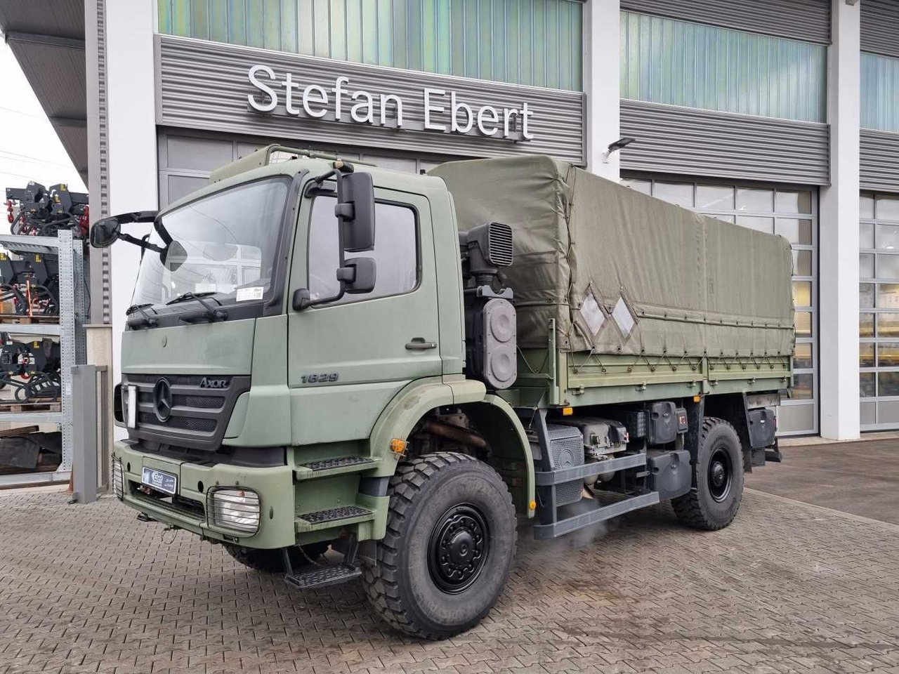 Mercedes-Benz Axor 1829 A 4x4 Pritsche/Plane 10 Stück - Tent veoauto: pilt 1 Mercedes-Benz Axor 1829 A 4x4 Pritsche/Plane 10 Stück - Tent veoauto: pilt 1