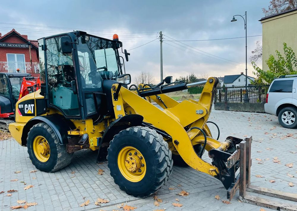 Caterpillar 907H - Rataslaadur: pilt 2 Caterpillar 907H - Rataslaadur: pilt 2