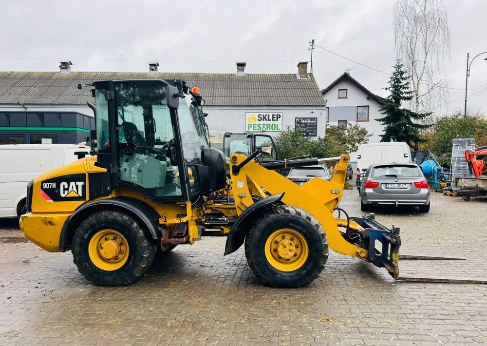 Caterpillar 907H - Rataslaadur: pilt 5 Caterpillar 907H - Rataslaadur: pilt 5