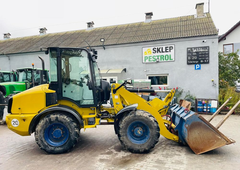Caterpillar 908H - Rataslaadur: pilt 1 Caterpillar 908H - Rataslaadur: pilt 1