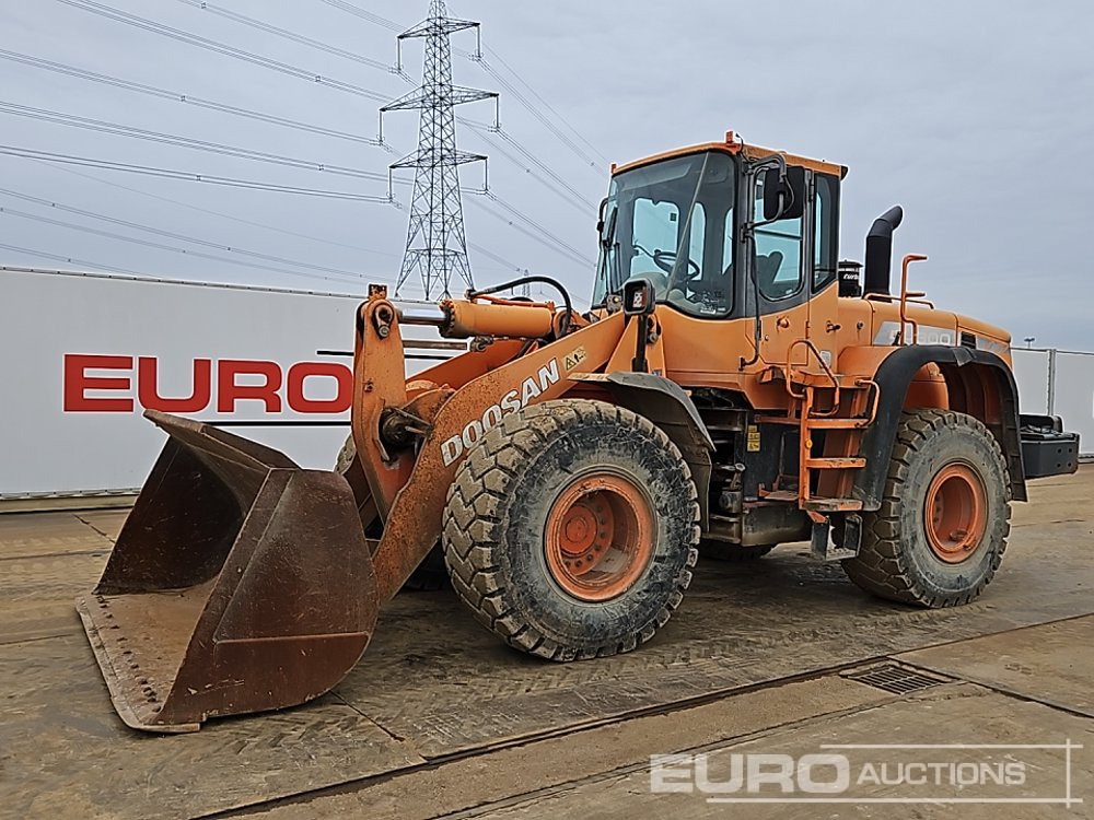 Doosan DL300 - Rataslaadur: pilt 1 Doosan DL300 - Rataslaadur: pilt 1