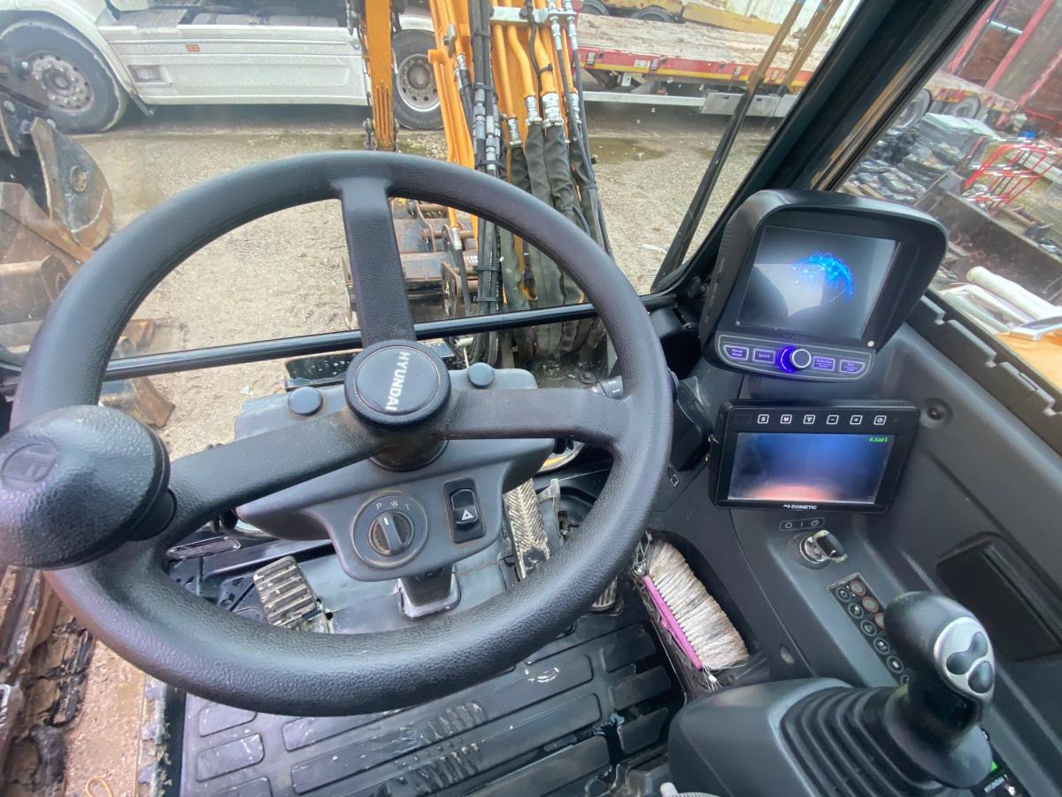 Ratastel ekskavaator Hyundai ROBEX 55W-9A: pilt 11