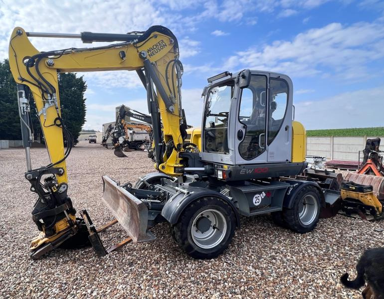 Neuson EW 100 - Ratastel ekskavaator: pilt 1 Neuson EW 100 - Ratastel ekskavaator: pilt 1