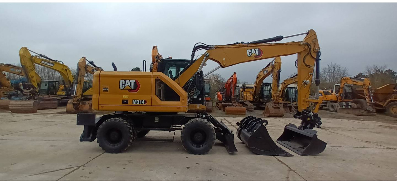 Ratastel ekskavaator CAT M314: pilt 12