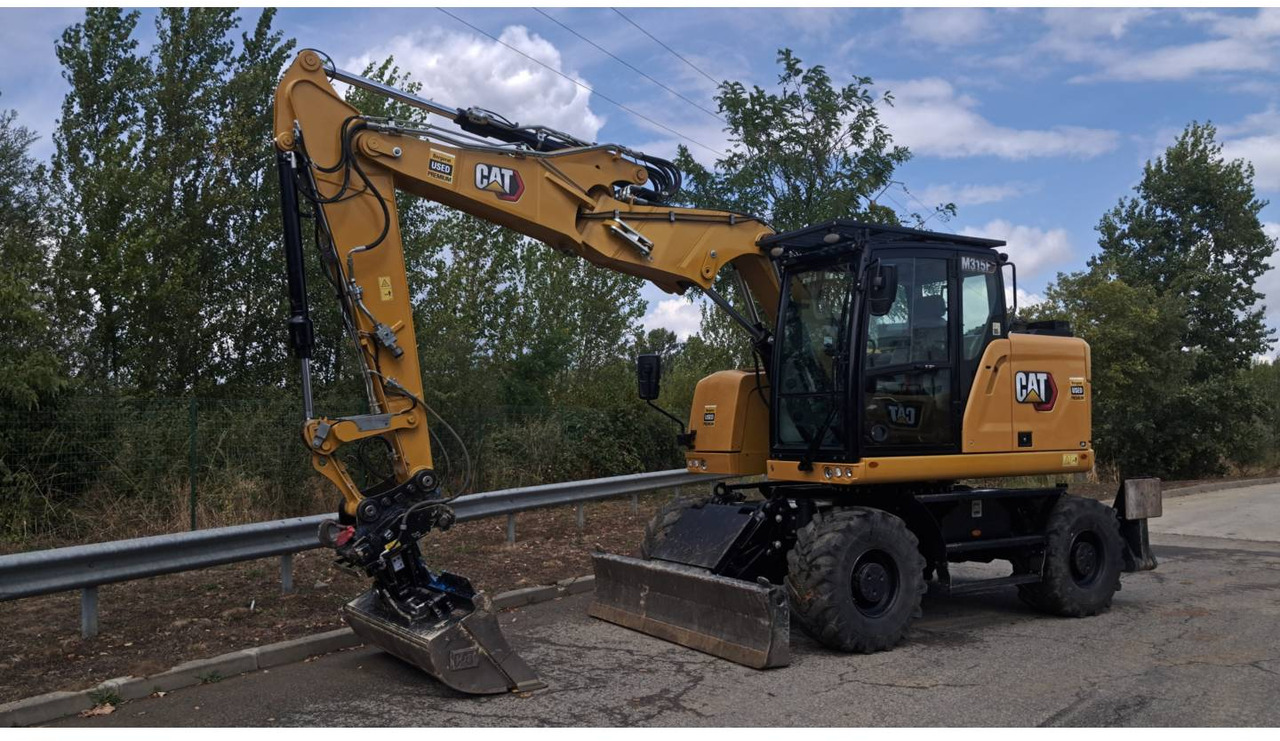 CAT M315F IVC - Ratastel ekskavaator: pilt 1 CAT M315F IVC - Ratastel ekskavaator: pilt 1