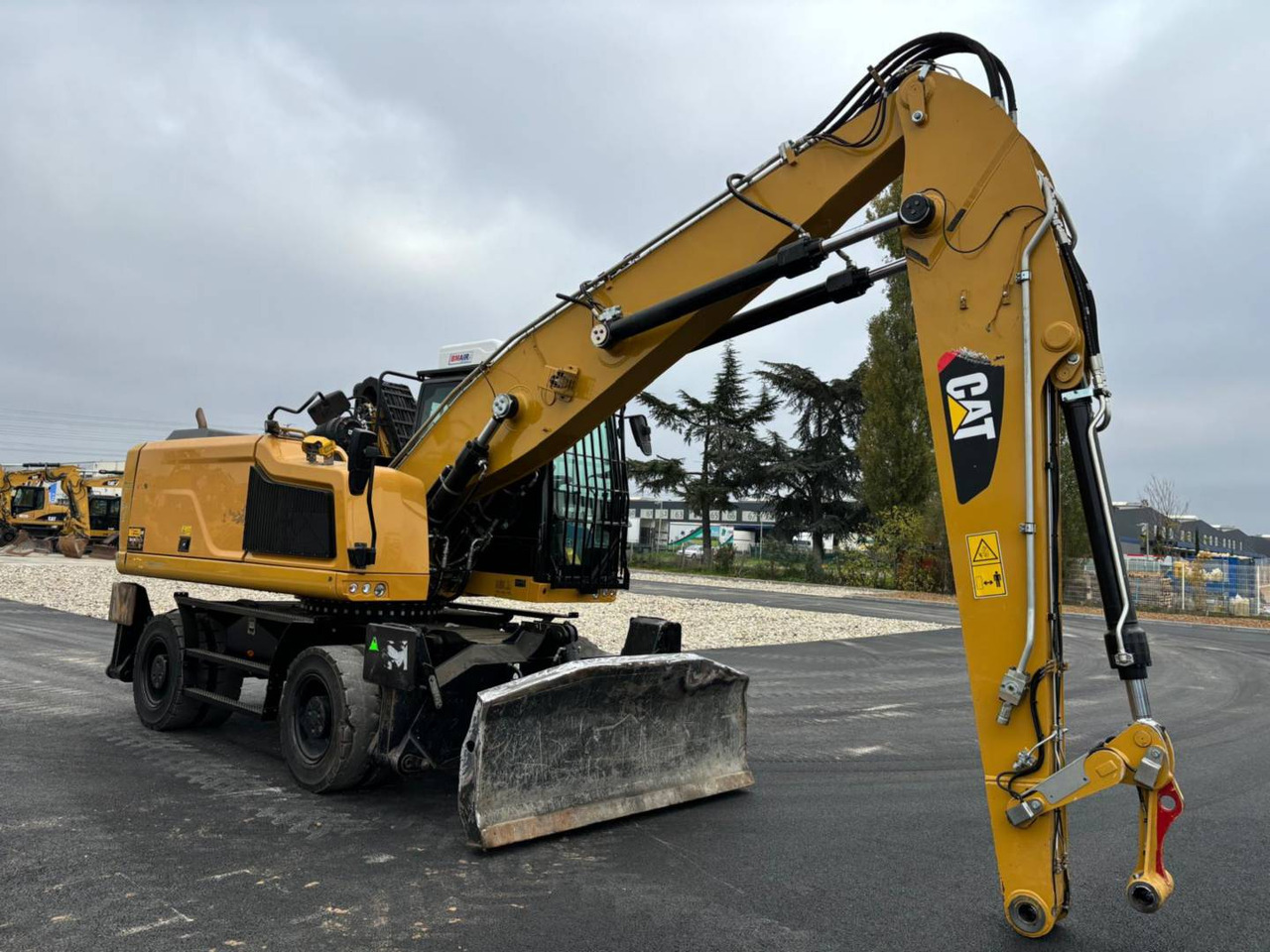 CAT MH3022-1 - Ratastel ekskavaator: pilt 1 CAT MH3022-1 - Ratastel ekskavaator: pilt 1