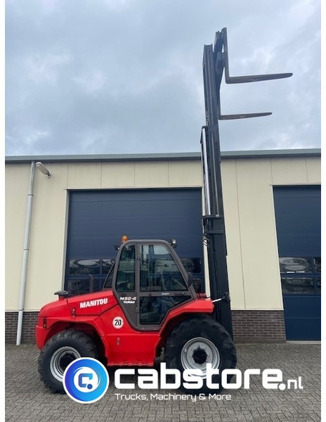 Manitou M 50-4 Turbo offroad forklift 4x4 Ruwterrein heftruck - Bouwjaar 2012 - Freelift - 5 Ton - Ebatasasel maastikul kohanduv kahveltõstuk: pilt 4 Manitou M 50-4 Turbo offroad forklift 4x4 Ruwterrein heftruck - Bouwjaar 2012 - Freelift - 5 Ton - Ebatasasel maastikul kohanduv kahveltõstuk: pilt 4