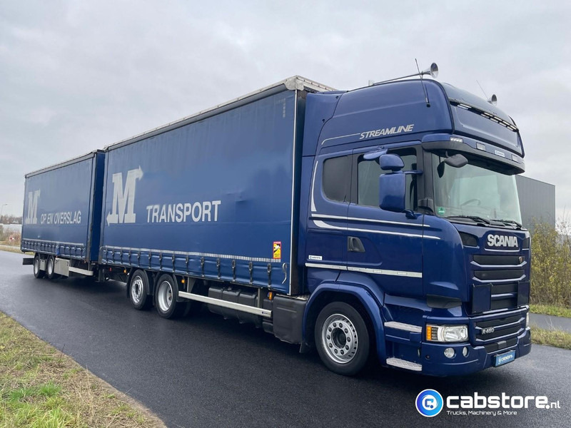 Scania R450 LB6X2MLB Euro 6 - Bouwjaar 2016 - Topline - Doorlaad-volume combi+ Wecon Middenas aanhangwagen - Good condition - Tent veoauto: pilt 1 Scania R450 LB6X2MLB Euro 6 - Bouwjaar 2016 - Topline - Doorlaad-volume combi+ Wecon Middenas aanhangwagen - Good condition - Tent veoauto: pilt 1