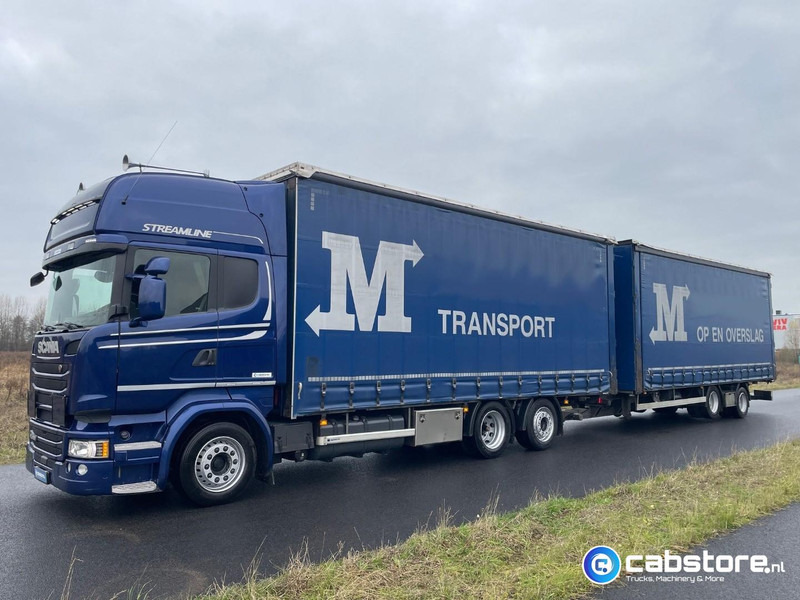 Scania R450 LB6X2MLB Euro 6 - Bouwjaar 2016 - Topline - Doorlaad-volume combi+ Wecon Middenas aanhangwagen - Good condition - Tent veoauto: pilt 2 Scania R450 LB6X2MLB Euro 6 - Bouwjaar 2016 - Topline - Doorlaad-volume combi+ Wecon Middenas aanhangwagen - Good condition - Tent veoauto: pilt 2