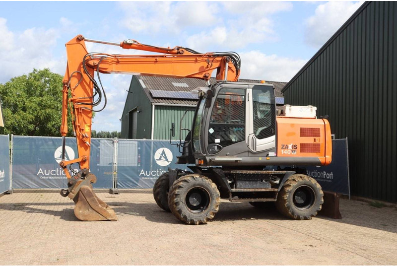 Hitachi ZX140W-3 - Ratastel ekskavaator: pilt 1 Hitachi ZX140W-3 - Ratastel ekskavaator: pilt 1
