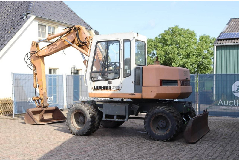 Liebherr A 310 - Ratastel ekskavaator: pilt 3 Liebherr A 310 - Ratastel ekskavaator: pilt 3