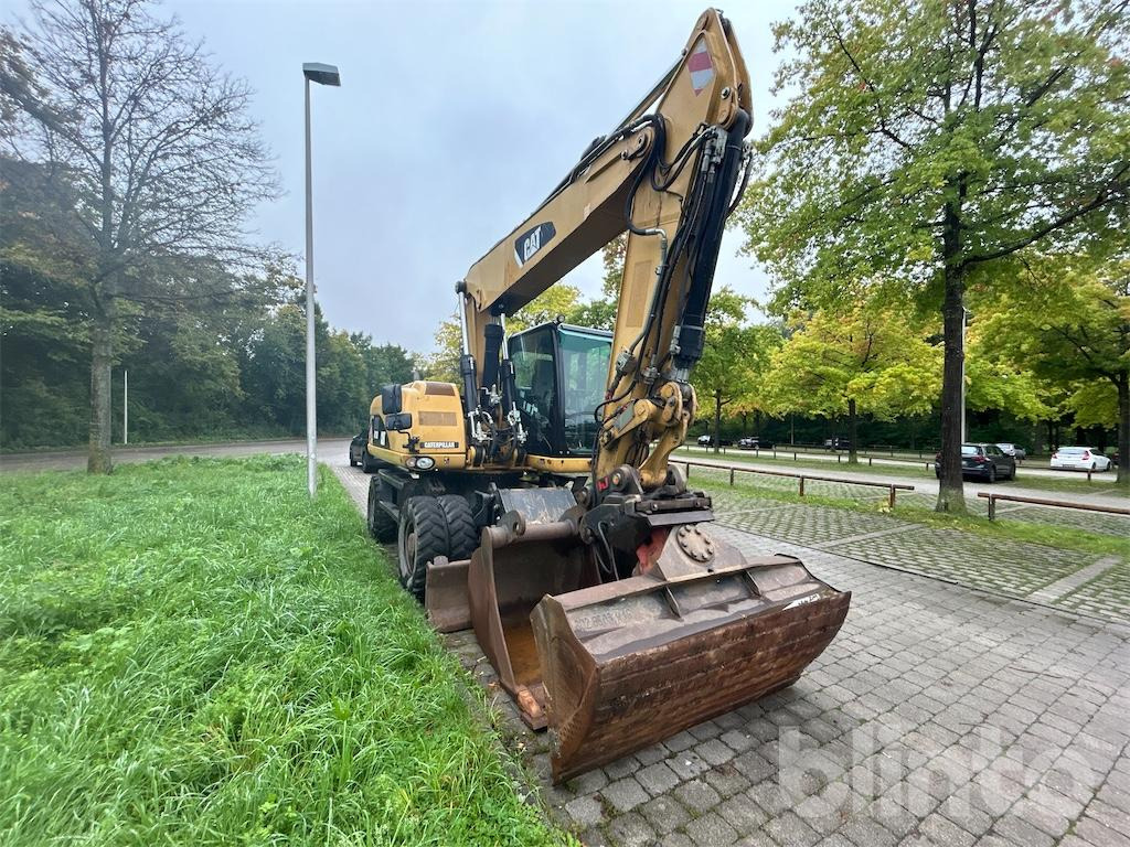 CAT M 318D - Ratastel ekskavaator: pilt 2 CAT M 318D - Ratastel ekskavaator: pilt 2