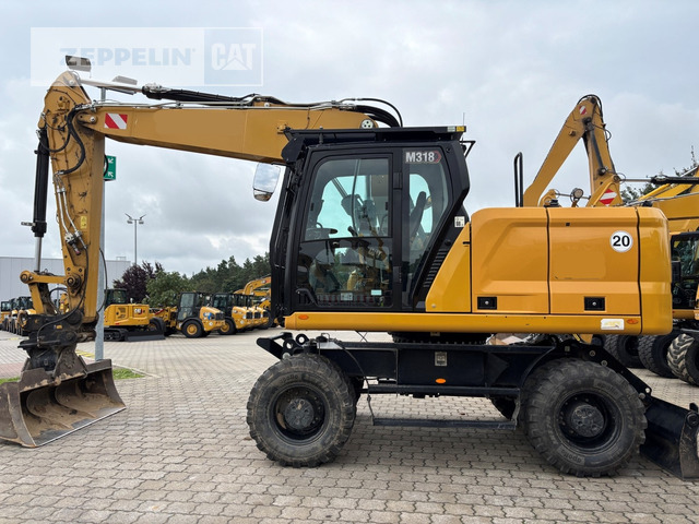 Cat M318-07A - Ratastel ekskavaator: pilt 1 Cat M318-07A - Ratastel ekskavaator: pilt 1