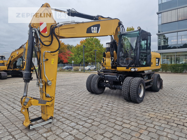 Cat M318D - Ratastel ekskavaator: pilt 1 Cat M318D - Ratastel ekskavaator: pilt 1