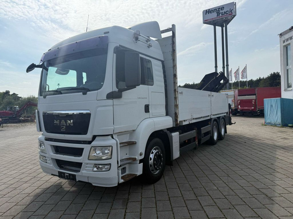 MAN TG-S 26.440 6x4 Pritsche Heckkran PK 27002+Funk - Madelveok/ Platvormveok, Kraanaga veoauto: pilt 1 MAN TG-S 26.440 6x4 Pritsche Heckkran PK 27002+Funk - Madelveok/ Platvormveok, Kraanaga veoauto: pilt 1