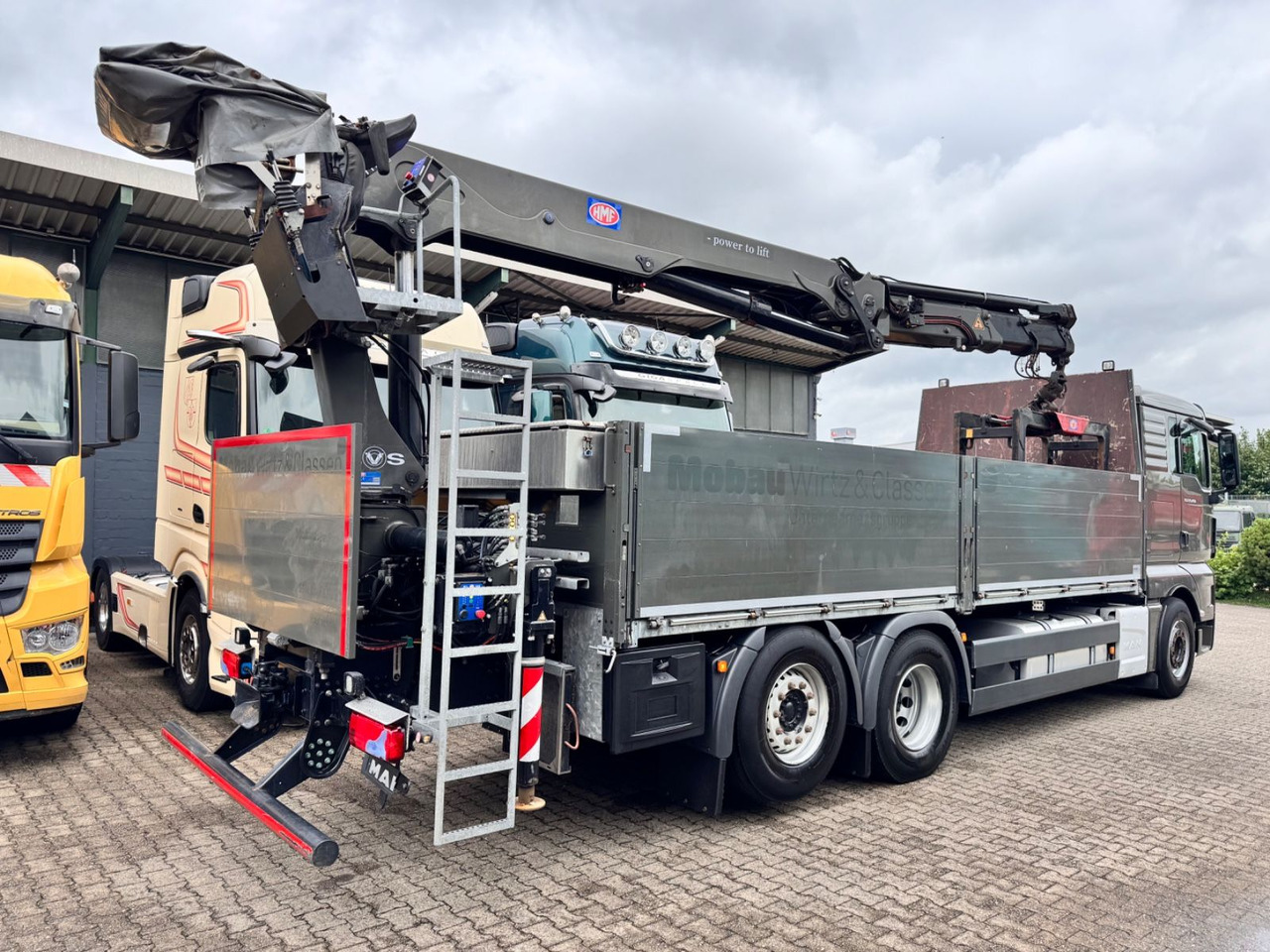 MAN 26.460 TGX Baustoffkran HMF 2110-L3 - Kraanaga veoauto: pilt 3 MAN 26.460 TGX Baustoffkran HMF 2110-L3 - Kraanaga veoauto: pilt 3