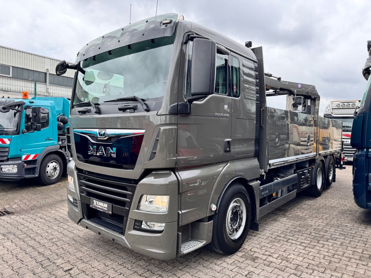 MAN 26.460 TGX Baustoffkran HMF 2110-L3 - Kraanaga veoauto: pilt 2 MAN 26.460 TGX Baustoffkran HMF 2110-L3 - Kraanaga veoauto: pilt 2